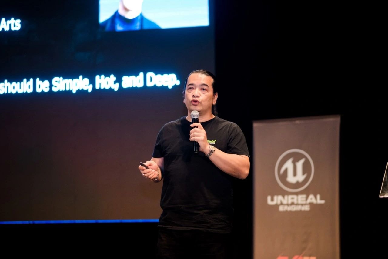 On stage at an industry conference